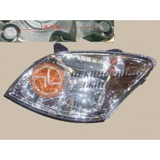 Фара головного света левая